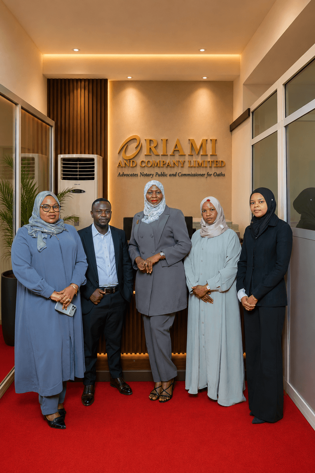 Riami Attorneys team in the office